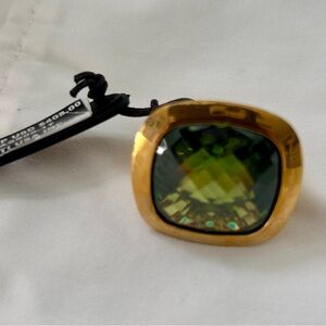 Rebecca Statement Ring with Large-faceted Green Peridot Stone.
